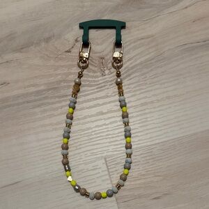 The CAEP beaded phone wristlet